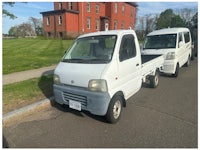 a white truck with a sold sign on it